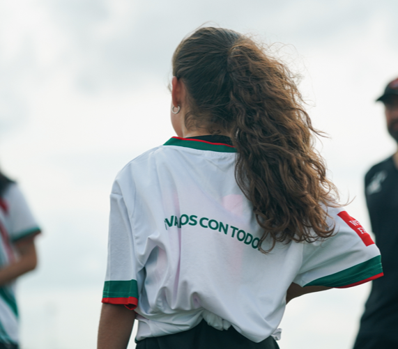 An image of a child wearing the Wells Fargo and the Mexican National Team branded jersey.